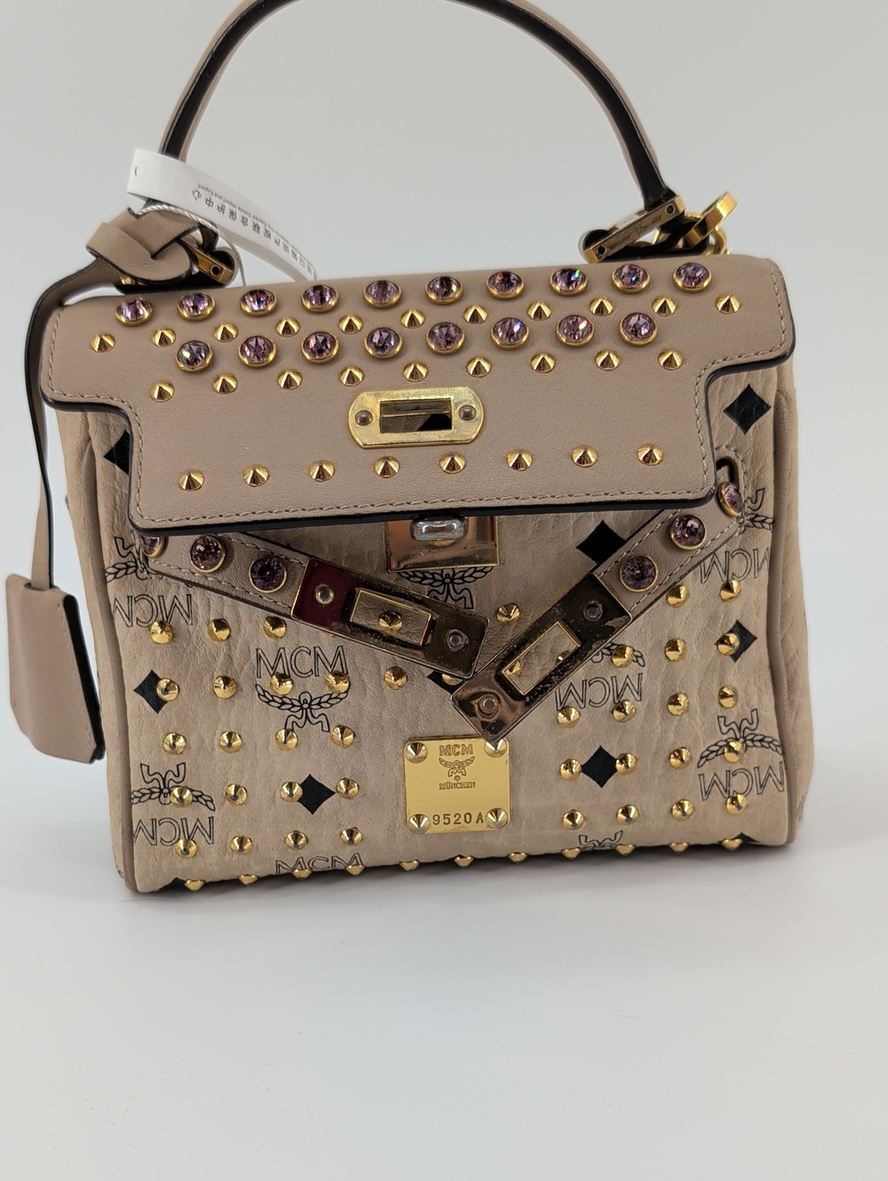 MCM Beige Visetos Top Handle Bag with Gold Hardware and Pink Crystal Studs